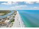 Stunning aerial view of the coastal property, showing its prime beachfront location and scenic surroundings at 14800 Walsingham Rd # 1215, Largo, FL 33774