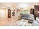 Inviting living room with tile flooring, neutral walls, and an open concept layout at 1626 Terra Ceia Bay Cir # 6, Palmetto, FL 34221