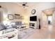 Comfortable living room offers an open layout, neutral colors, and tiled floors throughout the home at 1626 Terra Ceia Bay Cir # 6, Palmetto, FL 34221