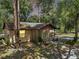 Charming home featuring a screened patio and lush landscaping at 1753 Ranchette Rd, Wesley Chapel, FL 33543