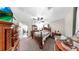 Comfortable main bedroom with wood furniture, a ceiling fan, and a TV, creating a relaxing retreat space at 1753 Ranchette Rd, Wesley Chapel, FL 33543