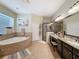 Luxurious bathroom featuring a soaking tub, walk-in shower, and dual vanities at 22925 Collridge Dr, Land O Lakes, FL 34639