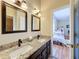 This bathroom has double sinks and a granite countertop at 22925 Collridge Dr, Land O Lakes, FL 34639