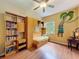 This themed bedroom features hardwood floors, a ceiling fan, and a palm tree mural at 22925 Collridge Dr, Land O Lakes, FL 34639