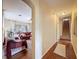 Hallway view into living area with staircase at 22925 Collridge Dr, Land O Lakes, FL 34639