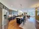 Modern kitchen featuring granite countertops, stainless steel appliances, and an island with seating at 22925 Collridge Dr, Land O Lakes, FL 34639