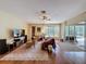 Spacious living room featuring hardwood floors and an open layout at 22925 Collridge Dr, Land O Lakes, FL 34639