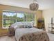 Bright living room with large window providing natural light and relaxing outdoor views at 22925 Collridge Dr, Land O Lakes, FL 34639