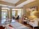 Elegant living room featuring hardwood floors, neutral walls, and stylish furnishings at 22925 Collridge Dr, Land O Lakes, FL 34639