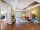 Spacious living area with hardwood floors and natural light, perfect for entertaining and relaxation at 22925 Collridge Dr, Land O Lakes, FL 34639