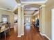 Open-concept living space with hardwood floors and seamless access to dining and living areas at 22925 Collridge Dr, Land O Lakes, FL 34639