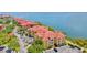 An aerial view of condos showcasing beautiful architecture, waterfront views, and convenient parking at 2739 Via Capri # 1039, Clearwater, FL 33764