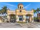 Ornate gates welcome you into the Bay Watch community with a clock tower at 2739 Via Capri # 1039, Clearwater, FL 33764