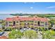 Stunning waterfront condos boast Mediterranean architecture, garage parking, and lush landscaping creating resort style living at 2739 Via Capri # 1039, Clearwater, FL 33764