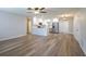Spacious living room features modern stainless steel appliances and beautiful hard surface flooring at 314 Circle Dr, Palm Harbor, FL 34683