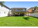 Spacious backyard and patio provides a serene and relaxing outdoor area at 3304 W Harbor View Ave, Tampa, FL 33611