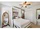 This bedroom shows a bed with a built-in frame and ample closet space at 3304 W Harbor View Ave, Tampa, FL 33611