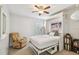 Bedroom includes a comfortable seating area next to a built-in bed frame at 3304 W Harbor View Ave, Tampa, FL 33611