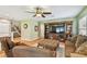 Bright and airy living room showing open access to the staircase and entertainment center at 3304 W Harbor View Ave, Tampa, FL 33611
