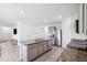 Open kitchen showcasing granite countertops, stainless steel appliances, and ample cabinet space for storage at 33657 Field Maple Loop, Wesley Chapel, FL 33545