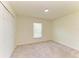 Bedroom offers comfortable carpeting, a double door closet, and a window with blinds at 3682 Johnstown St, North Port, FL 34288