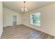 Neutral dining room filled with natural light from a large window at 3682 Johnstown St, North Port, FL 34288