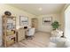Cozy home office featuring light colored walls and shelving at 3682 Johnstown St, North Port, FL 34288