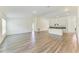 Spacious open floor plan with modern flooring and plenty of natural light at 3682 Johnstown St, North Port, FL 34288
