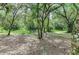 Tranquil park setting with picnic tables nestled among mature trees, offering a peaceful escape at 3682 Johnstown St, North Port, FL 34288