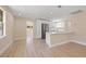 Bright kitchen featuring stainless steel appliances, white cabinets and a spacious island at 3940 Miramar S Way, St Petersburg, FL 33705