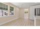 Bright open concept kitchen with plenty of light and new wood flooring at 3940 Miramar S Way, St Petersburg, FL 33705