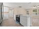 Bright kitchen featuring stainless steel appliances, white cabinets and a new stove at 3940 Miramar S Way, St Petersburg, FL 33705