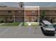 Inviting townhome featuring a classic exterior, reserved parking, and convenient front access at 4008 Pine Limb Ct, Tampa, FL 33614