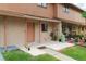 Charming townhome featuring a cozy porch and well-maintained landscaping at 4008 Pine Limb Ct, Tampa, FL 33614