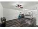 Large living room with wood floors and ample space for seating and entertainment at 4008 Pine Limb Ct, Tampa, FL 33614