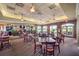 Spacious restaurant with ample seating, brick accents, large windows, and a fully stocked bar at 4495 Secretariat Run, Spring Hill, FL 34609