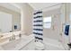 Bright bathroom featuring a shower and tub combination and a modern vanity at 4617 Basswood St, Land O Lakes, FL 34639