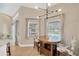 Charming breakfast nook with wooden table, accent chairs and natural lighting at 4617 Basswood St, Land O Lakes, FL 34639