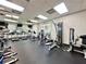 Community gym offering modern fitness equipment and large windows for a bright workout space at 4617 Basswood St, Land O Lakes, FL 34639