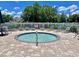 Relaxing hot tub area with comfortable lounge chairs for residents to unwind at 4617 Basswood St, Land O Lakes, FL 34639