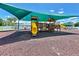 Community playground with covered play structure, providing fun for children in a safe environment at 4617 Basswood St, Land O Lakes, FL 34639