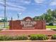 Attractive brick sign at the entrance to the deed-restricted 55+ Heritage Lake community at 4712 Coachmen Rd, New Port Richey, FL 34655