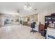Light-filled sunroom offering tile flooring, and providing multiple entry points to the home at 4712 Coachmen Rd, New Port Richey, FL 34655
