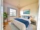 Serene bedroom with natural light and relaxing decor at 4950 Sandy Brook Cir, Wimauma, FL 33598