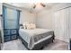 Comfortable bedroom with a bed, closet, and neutral colors at 5522 Appleton Shore Dr, Apollo Beach, FL 33572