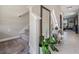 Welcoming entryway with stairs, a large mirror, and stylish decor, setting a sophisticated tone at 5522 Appleton Shore Dr, Apollo Beach, FL 33572
