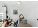 Bedroom featuring tile floors, a makeup vanity, natural light, and a ceiling fan at 5632 62Nd N St, St Petersburg, FL 33709