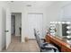 Bedroom featuring tile floors, a makeup vanity, natural light, and a ceiling fan at 5632 62Nd N St, St Petersburg, FL 33709