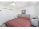 Bedroom with tile flooring, neutral walls, a ceiling fan, and good natural light at 5632 62Nd N St, St Petersburg, FL 33709