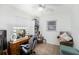 Bedroom featuring tile floors, a makeup vanity, natural light, and a ceiling fan at 5632 62Nd N St, St Petersburg, FL 33709